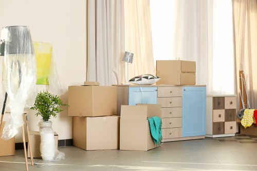 Packed moving boxes and furniture prepared for Waterloo removals