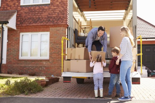 Removal team loading household items for a UK move
