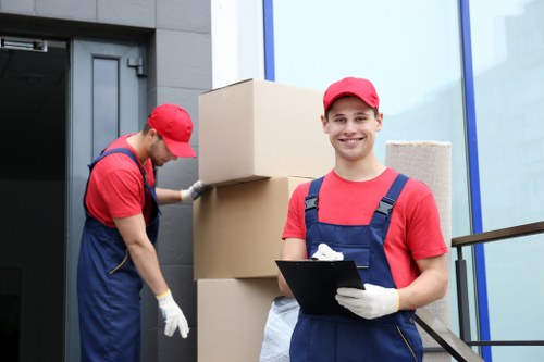 Warehouse team reviewing modern slavery compliance documents