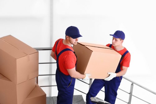 Professional movers handling furniture removals in Waterloo on a city street
