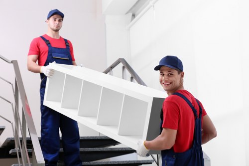People moving boxes during a Waterloo home relocation