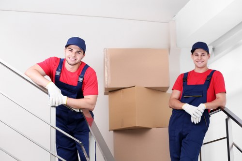 Removal team sorting recyclable packing materials in Waterloo