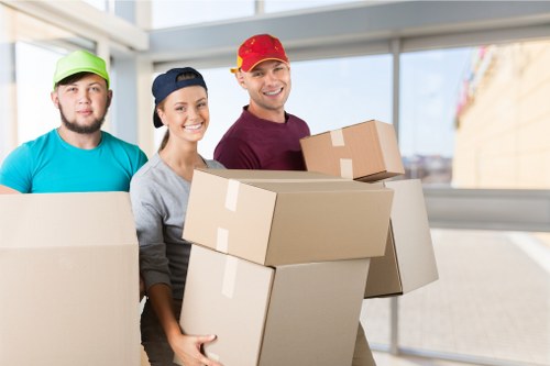 Professional movers loading office equipment in Waterloo