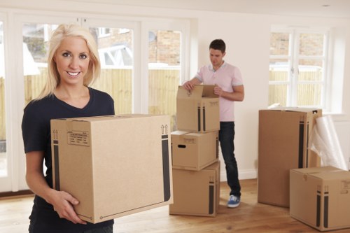 Furniture being carried safely through a Waterloo property