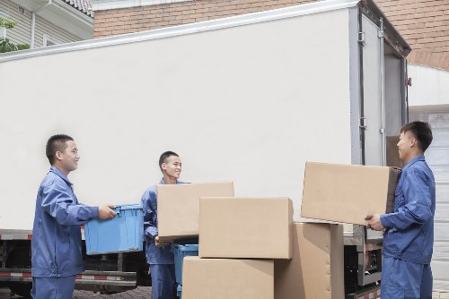 Packed boxes and furniture ready for transit
