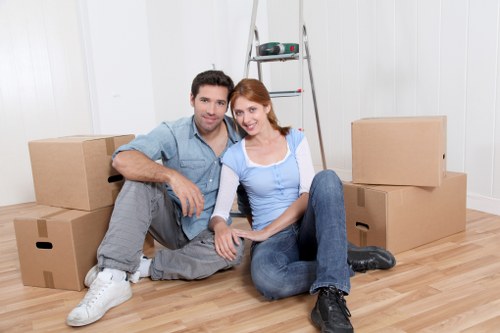 Professional movers handling office furniture during a Waterloo move